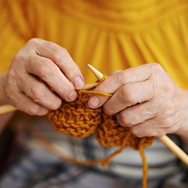 person knitting 