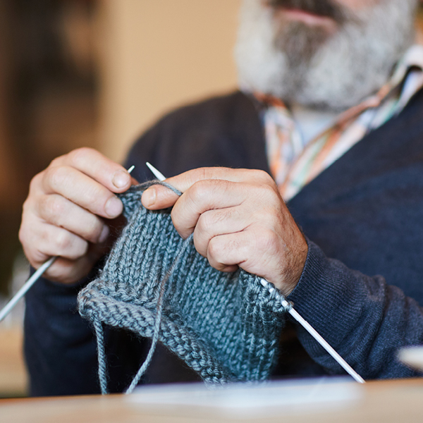 person knitting  